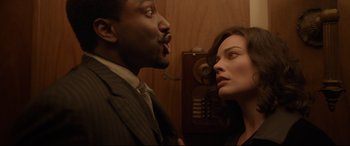 Movie still from “Amsterdam” (2022), directed by David O. Russell – Close Up shot, Over the shoulder angle