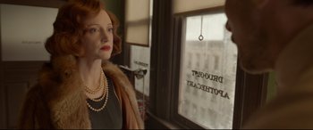 Movie still from “Amsterdam” (2022), directed by David O. Russell – Medium shot, Low angle