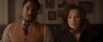 Movie still from “Amsterdam” (2022), directed by David O. Russell – Close Up shot, Over the shoulder angle