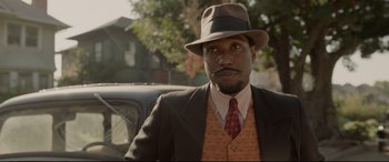 Movie still from “Amsterdam” (2022), directed by David O. Russell – Close Up shot, Over the shoulder angle