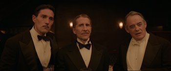 Movie still from “Amsterdam” (2022), directed by David O. Russell – Medium shot, Low angle