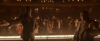 Movie still from “Amsterdam” (2022), directed by David O. Russell – Wide shot, Over the shoulder angle