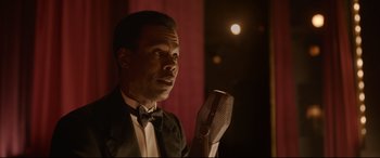 Movie still from “Amsterdam” (2022), directed by David O. Russell – Close Up shot, Over the shoulder angle