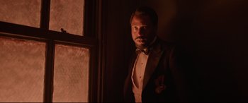 Movie still from “Amsterdam” (2022), directed by David O. Russell – Medium shot, Low angle