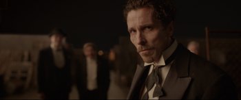 Movie still from “Amsterdam” (2022), directed by David O. Russell – Close Up shot, Over the shoulder angle