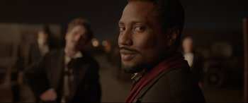 Movie still from “Amsterdam” (2022), directed by David O. Russell – Close Up shot, Over the shoulder angle