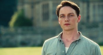 Movie still from “Atonement” (2007), directed by Joe Wright – A young man in front of a building; Close Up shot, Low angle