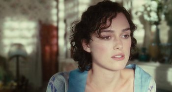 Movie still from “Atonement” (2007), directed by Joe Wright – A person with curly hair; Close Up shot, Over the shoulder angle