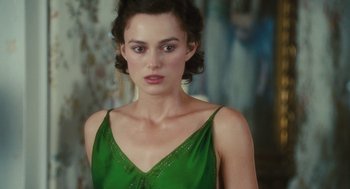 Movie still from “Atonement” (2007), directed by Joe Wright – A person wearing a green dress; Close Up shot, Over the shoulder angle