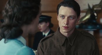 Movie still from “Atonement” (2007), directed by Joe Wright – A man in a military uniform looking at a woman in a uniform; Close Up shot, Over the shoulder angle