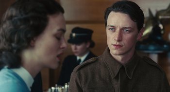 Movie still from “Atonement” (2007), directed by Joe Wright – A man and a woman in a military uniform; Close Up shot, Over the shoulder angle