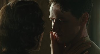 A man and a woman looking at each other