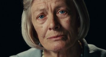 Movie still from “Atonement” (2007), directed by Joe Wright – An older woman with a sad look on her face; Close Up shot, Low angle