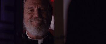 Movie still from “Bad Times at the El Royale” (2018), directed by Drew Goddard – An old man with a beard and a white beard; Close Up shot, Low angle