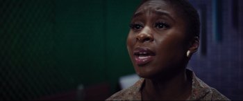 Movie still from “Bad Times at the El Royale” (2018), directed by Drew Goddard – A person looking at the camera; Close Up shot, Over the shoulder angle