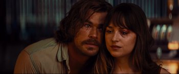 Movie still from “Bad Times at the El Royale” (2018), directed by Drew Goddard – A man and a woman standing next to each other; Close Up shot, Over the shoulder angle