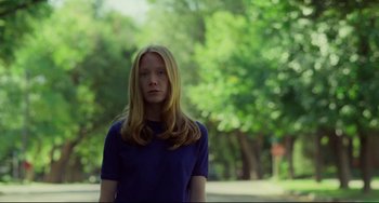 Movie still from “Badlands” (1973), directed by Terrence Malick – A woman standing in the middle of a park; Medium shot, Low angle