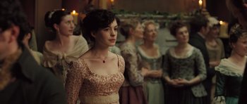 Movie still from “Becoming Jane” (2007), directed by Julian Jarrold – A group of women standing next to each other in a room; Medium shot, Over the shoulder angle