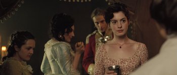 Movie still from “Becoming Jane” (2007), directed by Julian Jarrold – Three people standing in front of each other; Medium shot, Over the shoulder angle