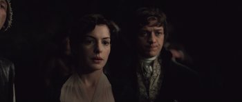 Movie still from “Becoming Jane” (2007), directed by Julian Jarrold – A man and a woman standing next to each other in the dark; Close Up shot, Over the shoulder angle