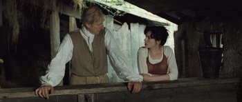 Movie still from “Becoming Jane” (2007), directed by Julian Jarrold – A man and a woman standing next to each other; Medium shot, Over the shoulder angle