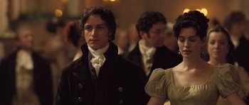 Movie still from “Becoming Jane” (2007), directed by Julian Jarrold – A group of people standing in a room; Close Up shot, Over the shoulder angle