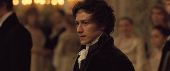 Movie still from “Becoming Jane” (2007), directed by Julian Jarrold – A man in a black jacket and a white shirt; Close Up shot, Over the shoulder angle