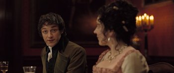 Movie still from “Becoming Jane” (2007), directed by Julian Jarrold – A man and a woman are sitting in front of each other; Close Up shot, Over the shoulder angle
