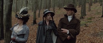 Movie still from “Becoming Jane” (2007), directed by Julian Jarrold – A man and a woman dressed in period clothing in the woods; Medium shot, Over the shoulder angle