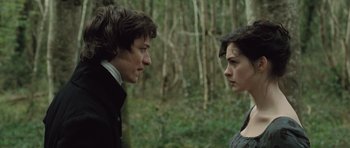 Movie still from “Becoming Jane” (2007), directed by Julian Jarrold – A man and a woman face to face in the woods; Close Up shot, Over the shoulder angle