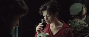 Movie still from “Becoming Jane” (2007), directed by Julian Jarrold – A woman drinking a glass of red wine; Close Up shot, Over the shoulder angle