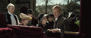 Movie still from “Becoming Jane” (2007), directed by Julian Jarrold – A group of young people standing next to each other; Medium shot, Low angle