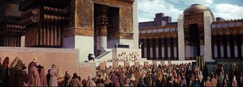 Movie still from “Ben-Hur” (1959), directed by William Wyler – A crowd of people gathered in front of a building; Extreme Wide shot, High angle