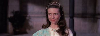 Movie still from “Ben-Hur” (1959), directed by William Wyler – A person with long hair; Close Up shot, Over the shoulder angle