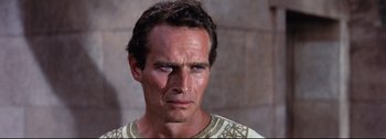 Movie still from “Ben-Hur” (1959), directed by William Wyler – A person wearing a t - shirt; Close Up shot, High angle
