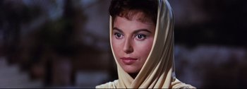 Movie still from “Ben-Hur” (1959), directed by William Wyler – A person wearing a head scarf; Close Up shot, Over the shoulder angle