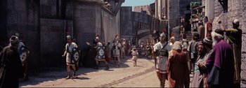 Movie still from “Ben-Hur” (1959), directed by William Wyler – A group of people in ancient roman clothing; Wide shot, High angle