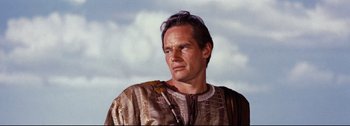 Movie still from “Ben-Hur” (1959), directed by William Wyler – A person wearing a robe; Close Up shot, Low angle