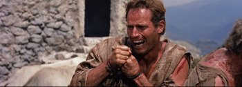 Movie still from “Ben-Hur” (1959), directed by William Wyler – A person holding something in his hand; Close Up shot, Low angle