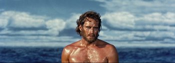 Movie still from “Ben-Hur” (1959), directed by William Wyler – A man with a long beard is standing in the water; Close Up shot, Low angle