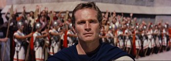Movie still from “Ben-Hur” (1959), directed by William Wyler – A person wearing a blue t - shirt; Close Up shot, Low angle