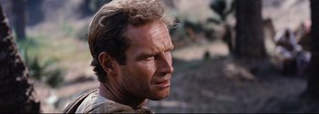 Movie still from “Ben-Hur” (1959), directed by William Wyler – A man's face in the wilderness; Close Up shot, Over the shoulder angle