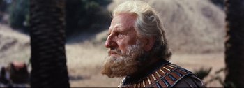 Movie still from “Ben-Hur” (1959), directed by William Wyler – An old man with a long white beard; Close Up shot, Low angle
