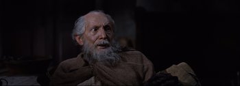 Movie still from “Ben-Hur” (1959), directed by William Wyler – An old man with a long white beard; Close Up shot, Low angle