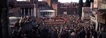 Movie still from “Ben-Hur” (1959), directed by William Wyler – A crowd of people standing in front of a building; Extreme Wide shot, High angle