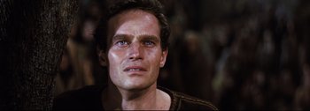 Movie still from “Ben-Hur” (1959), directed by William Wyler – A person wearing a shirt; Close Up shot, Over the shoulder angle