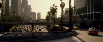 Movie still from “Collateral” (2004), directed by Michael Mann – A view of a busy freeway from a moving vehicle; Extreme Wide shot, High angle
