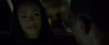 Movie still from “Collateral” (2004), directed by Michael Mann – A person sitting in a car at night; Close Up shot, Over the shoulder angle