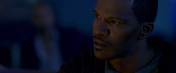 Movie still from “Collateral” (2004), directed by Michael Mann – A person with his eyes wide open; Close Up shot, High angle