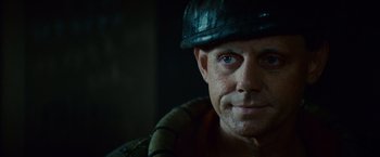 Movie still from “Blade Runner” (1982), directed by Ridley Scott – A person wearing a hat; Close Up shot, Over the shoulder angle